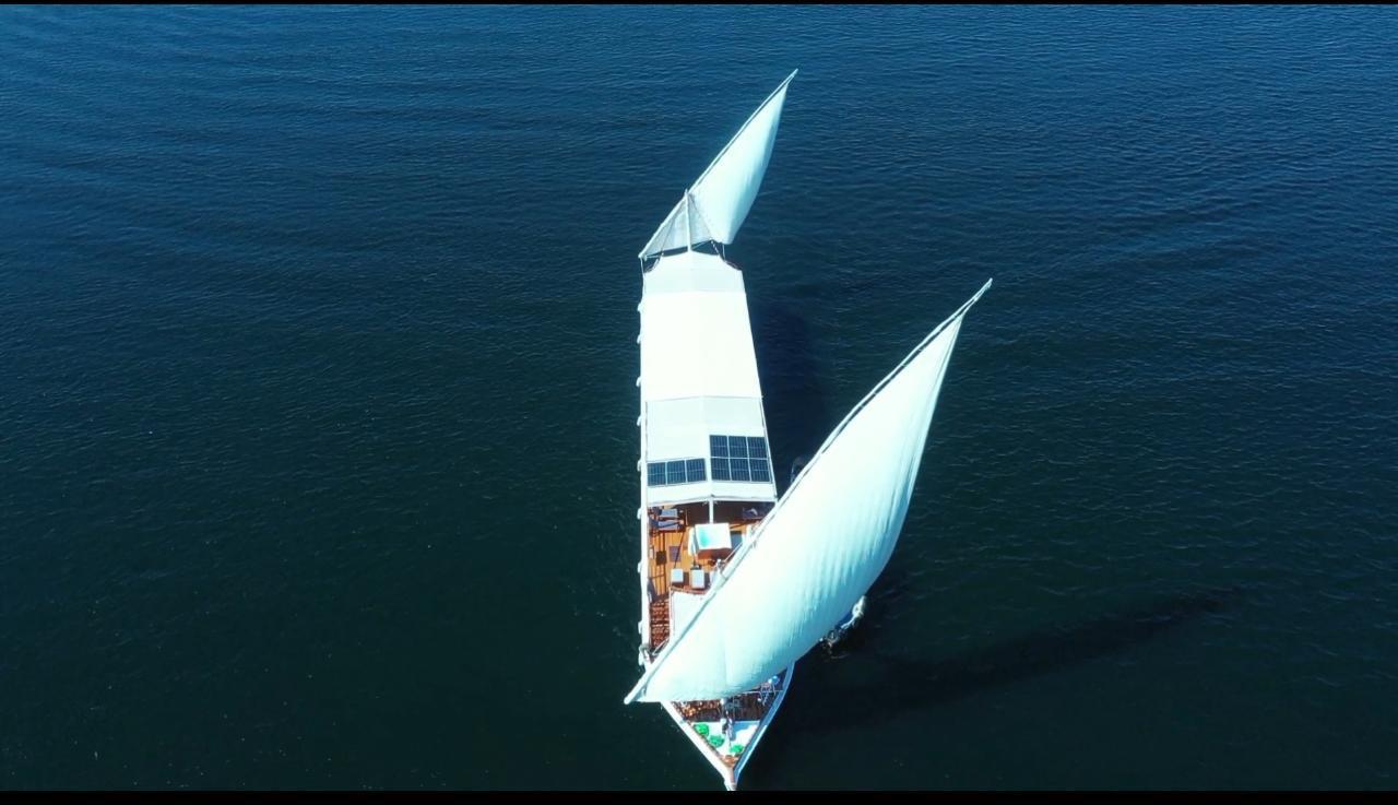 Aerial view of the dahabiya sailing on deep blue water