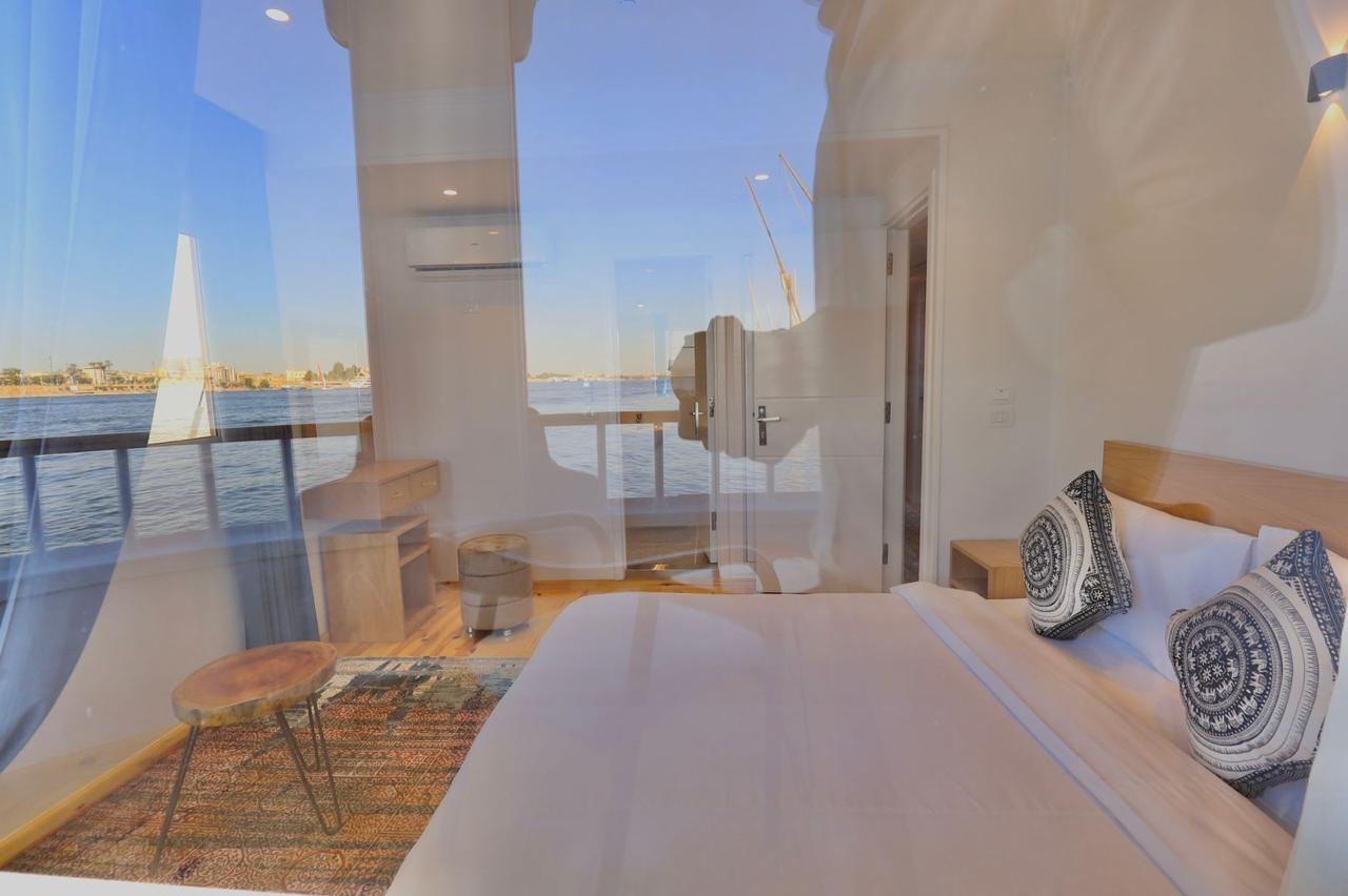 Dahabiya cabin with river view through the window
