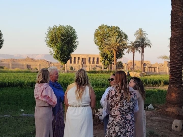 Women gathering outside Dendera Temple