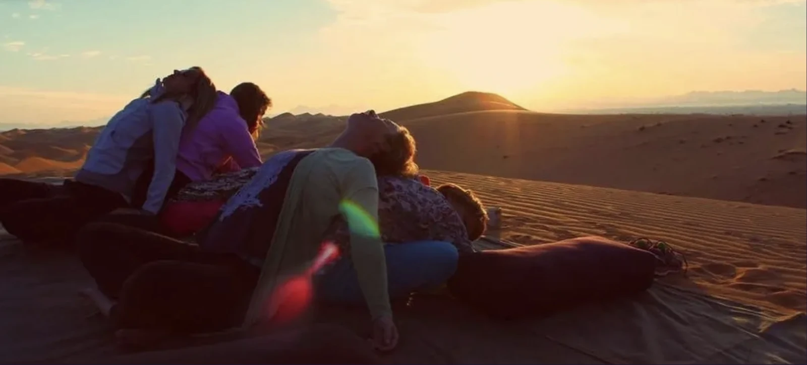 A supported Yin Yoga practice at sunset in the desert